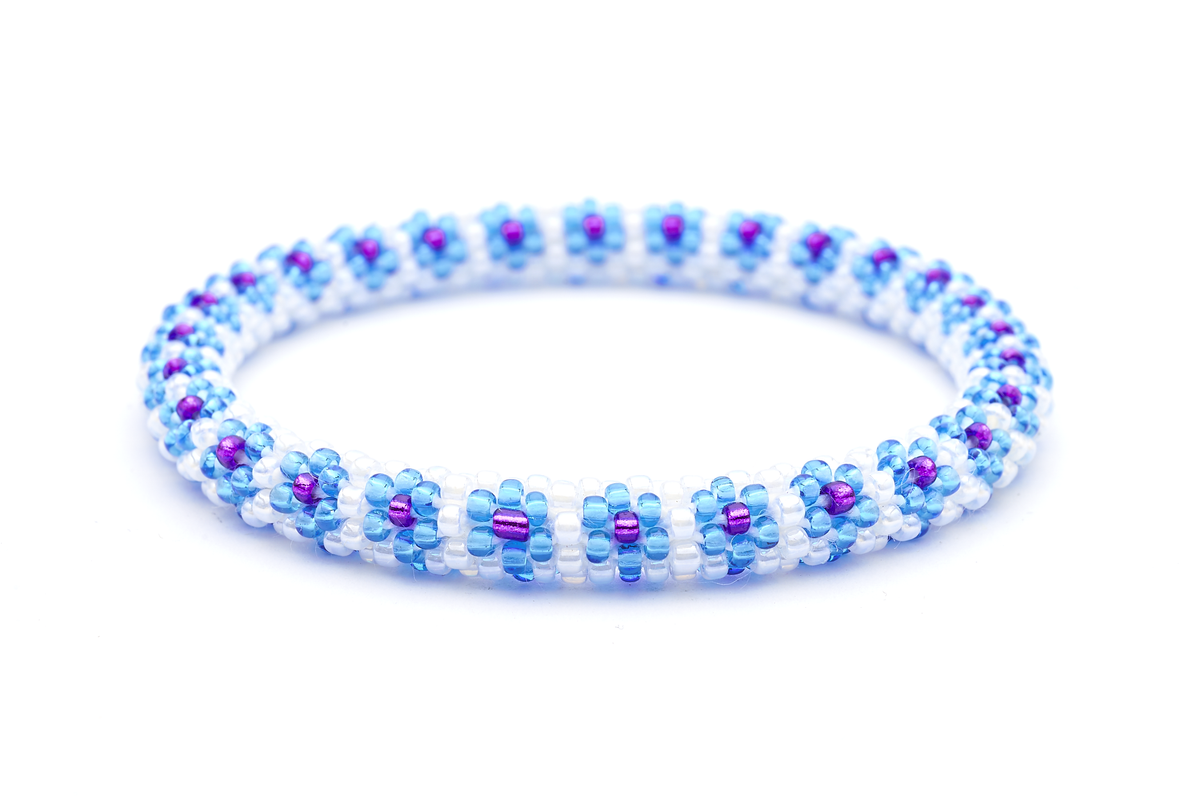 Sashka Co. Blue , White , Purple Bracelet. Handmade glass bead bracelet from Nepal, featuring a roll design.
 