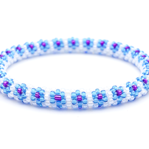 Sashka Co. Blue , White , Purple Bracelet. Handmade glass bead bracelet from Nepal, featuring a roll design.
 