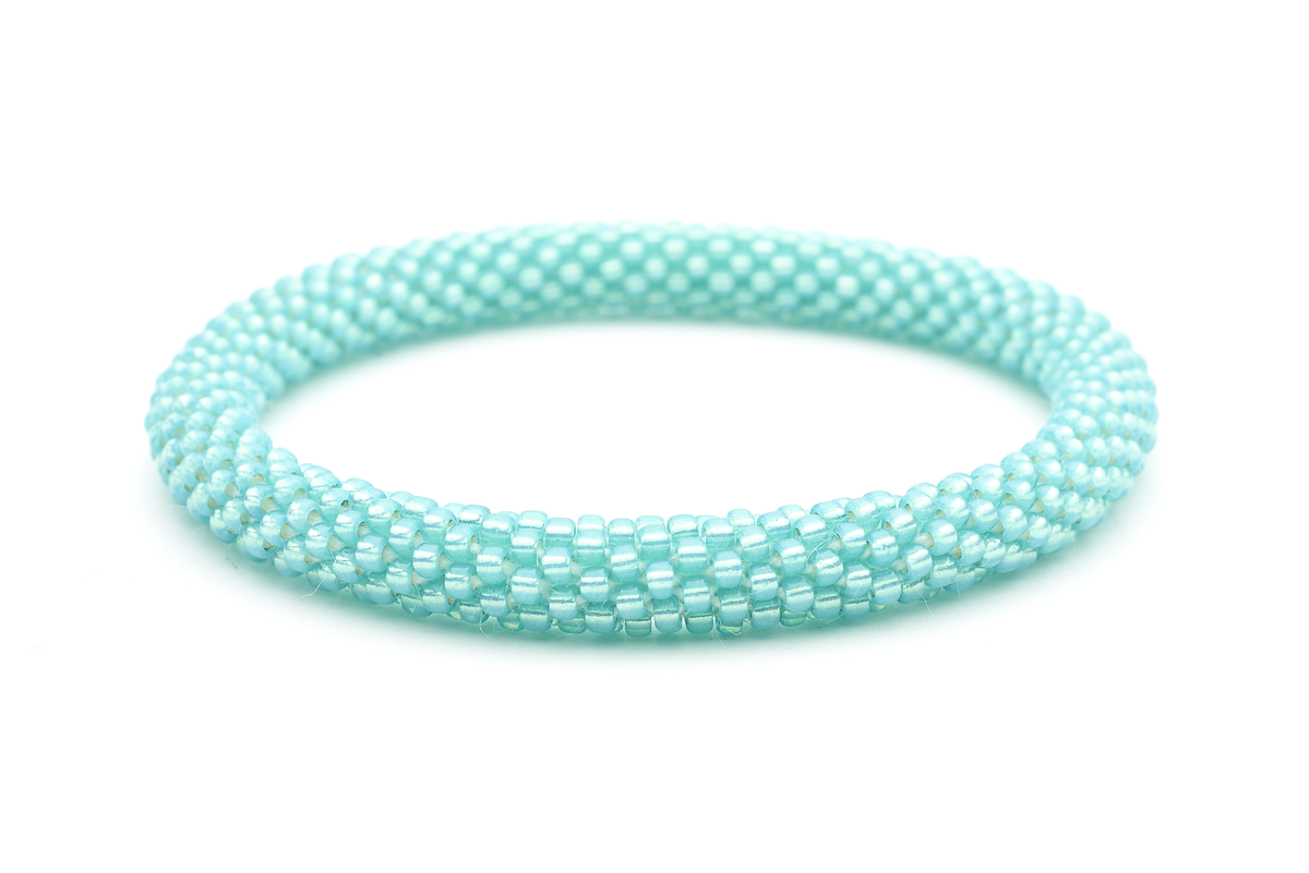 Sashka Co handmade beaded friendship bracelet with aqua and turquoise glass beads. Crafted in Nepal by skilled artisans.