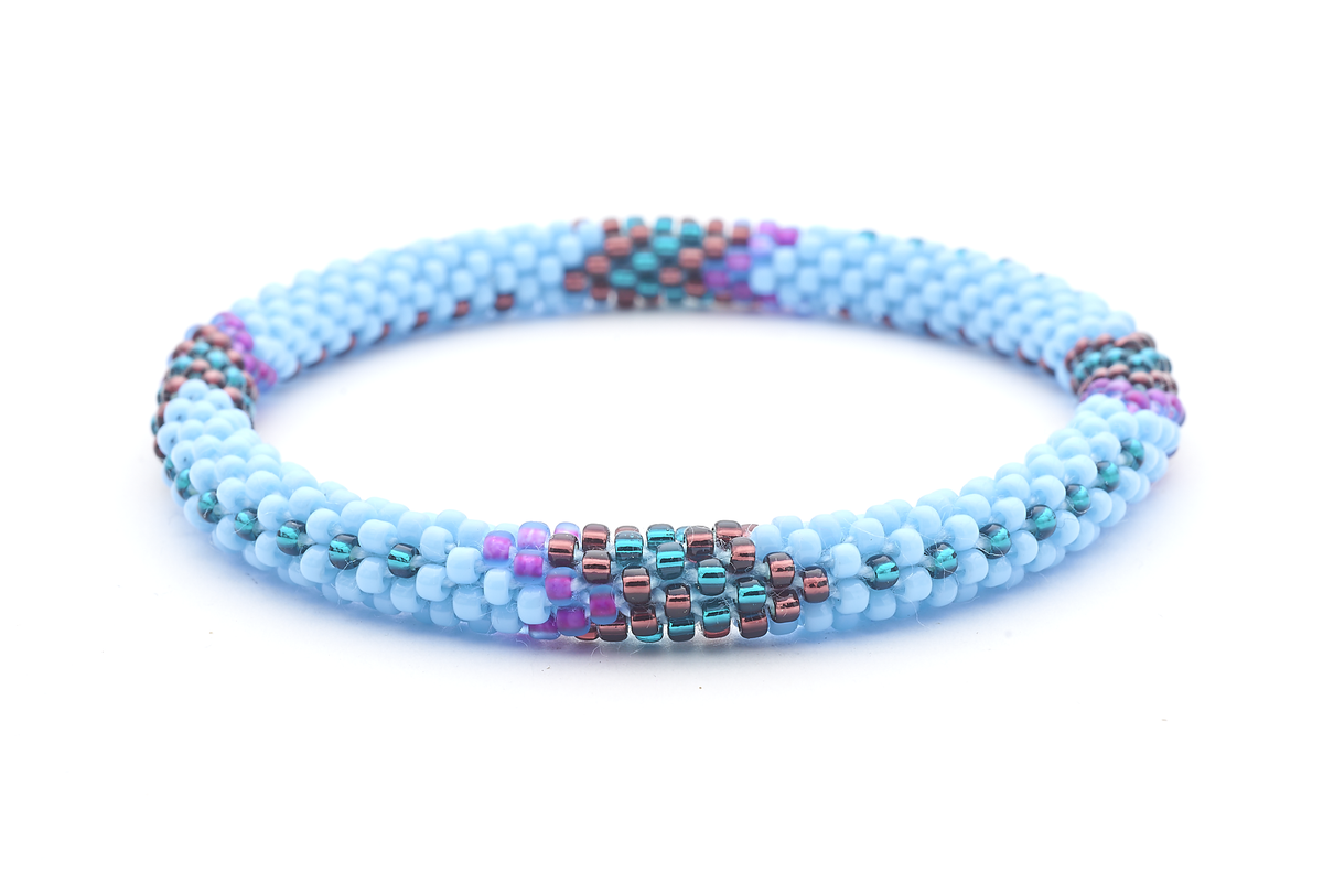 Sashka Co. handmade glass beaded friendship bracelet with baby blue, purple, deep purple, and teal glass beads. Crafted in Nepal by skilled artisans.