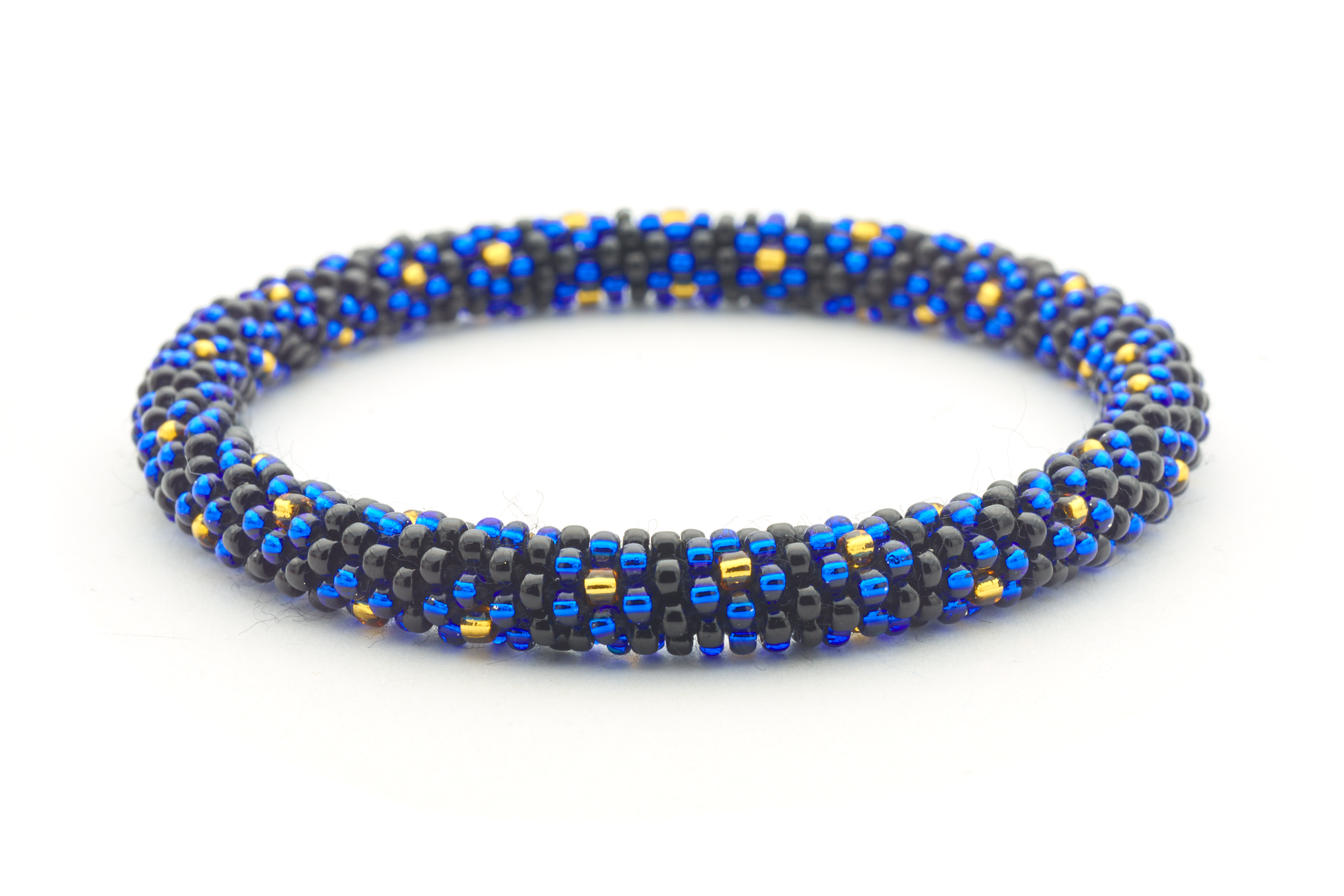 Sashka Co handmade beaded friendship bracelet with black, blue, and gold glass beads. Crafted in Nepal by skilled artisans.