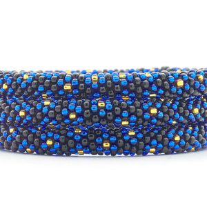 Sashka Co handmade beaded friendship bracelet with black, blue, and gold glass beads. Crafted in Nepal by skilled artisans.