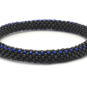 Sashka Co. handmade glass beaded friendship bracelet with black and blue glass beads. Crafted in Nepal by skilled artisans.