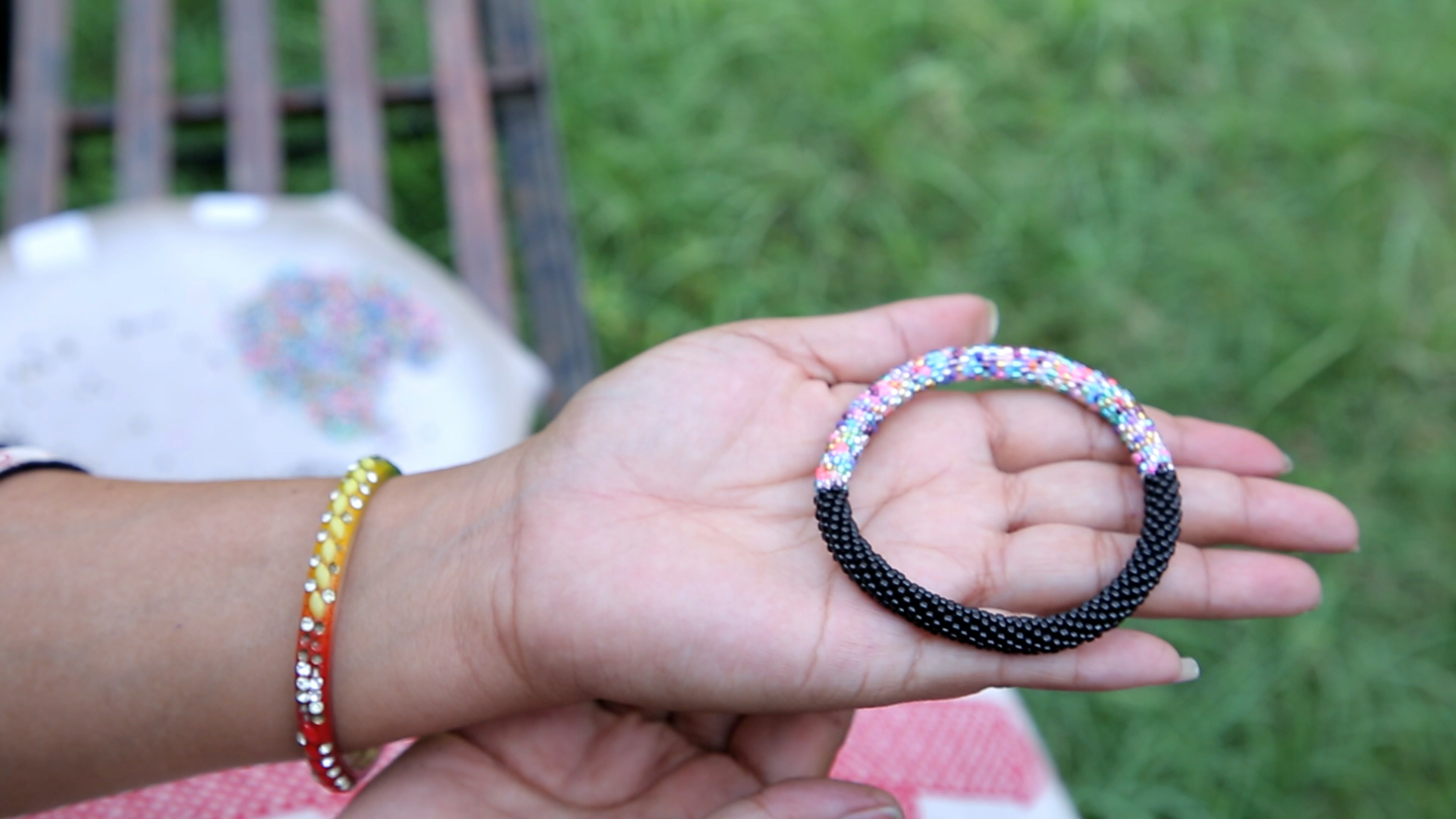 Sashka Co handmade beaded friendship bracelet with black and mixed confetti glass beads in a half-and-half design. Crafted in Nepal by skilled artisans.