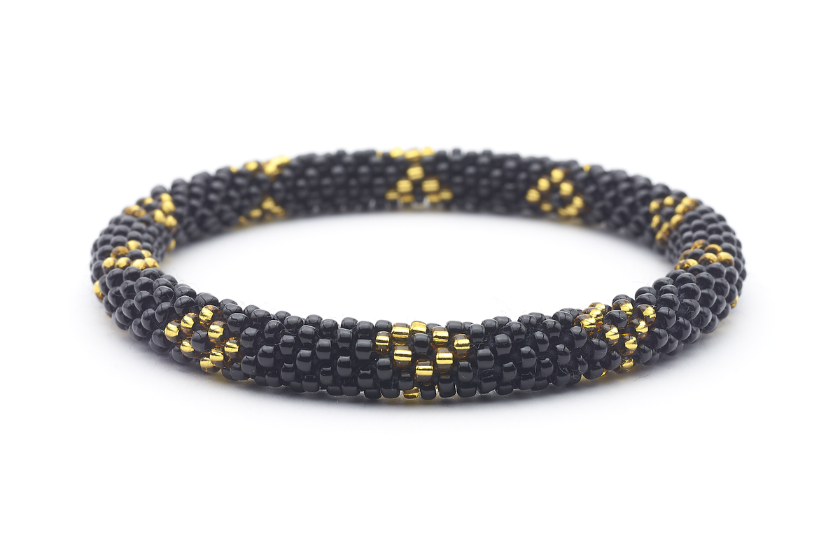 Sashka Co handmade beaded friendship bracelet with black and gold glass beads in a diamond design. Crafted in Nepal by skilled artisans.