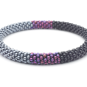 Sashka Co. handmade glass beaded friendship bracelet with black, silver, and deep purple glass beads in a block pattern. Crafted in Nepal by skilled artisans.