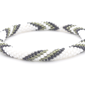 Sashka Co handmade beaded friendship bracelet with black, white, and silver glass beads. Crafted in Nepal by skilled artisans.