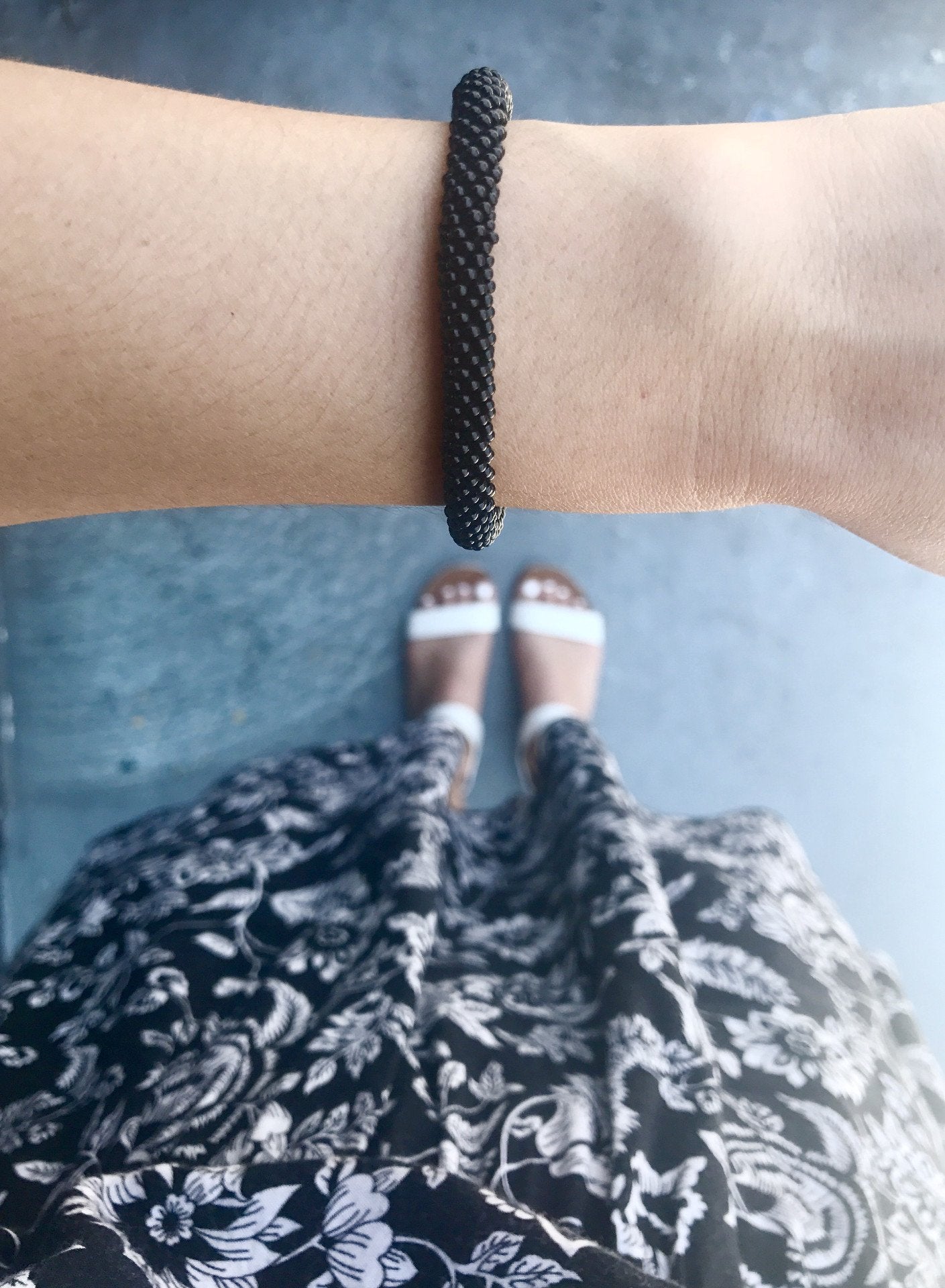 Sashka Co handmade beaded friendship bracelet with solid black glass beads. Crafted in Nepal by skilled artisans.