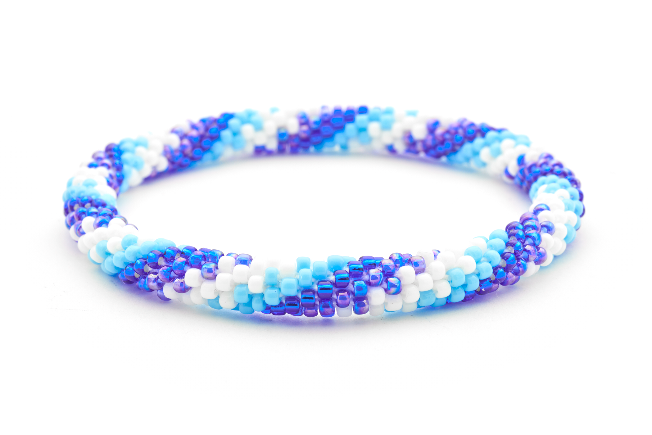 Handmade beaded friendship bracelet with blue, light blue, and white glass beads. Crafted by artisans in Nepal for Sashka Co.
