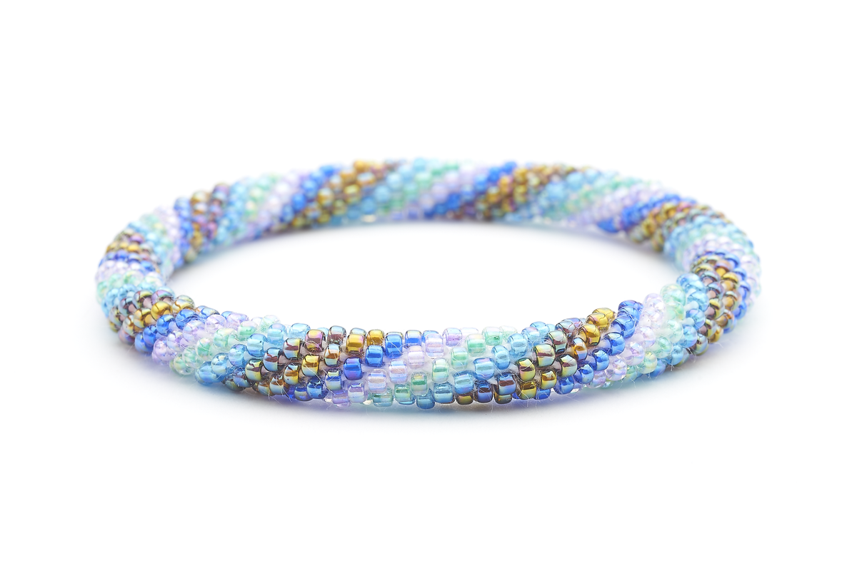 Sashka Co handmade beaded friendship bracelet with blue, purple, aqua, and iridescent glass beads. Crafted in Nepal by skilled artisans.