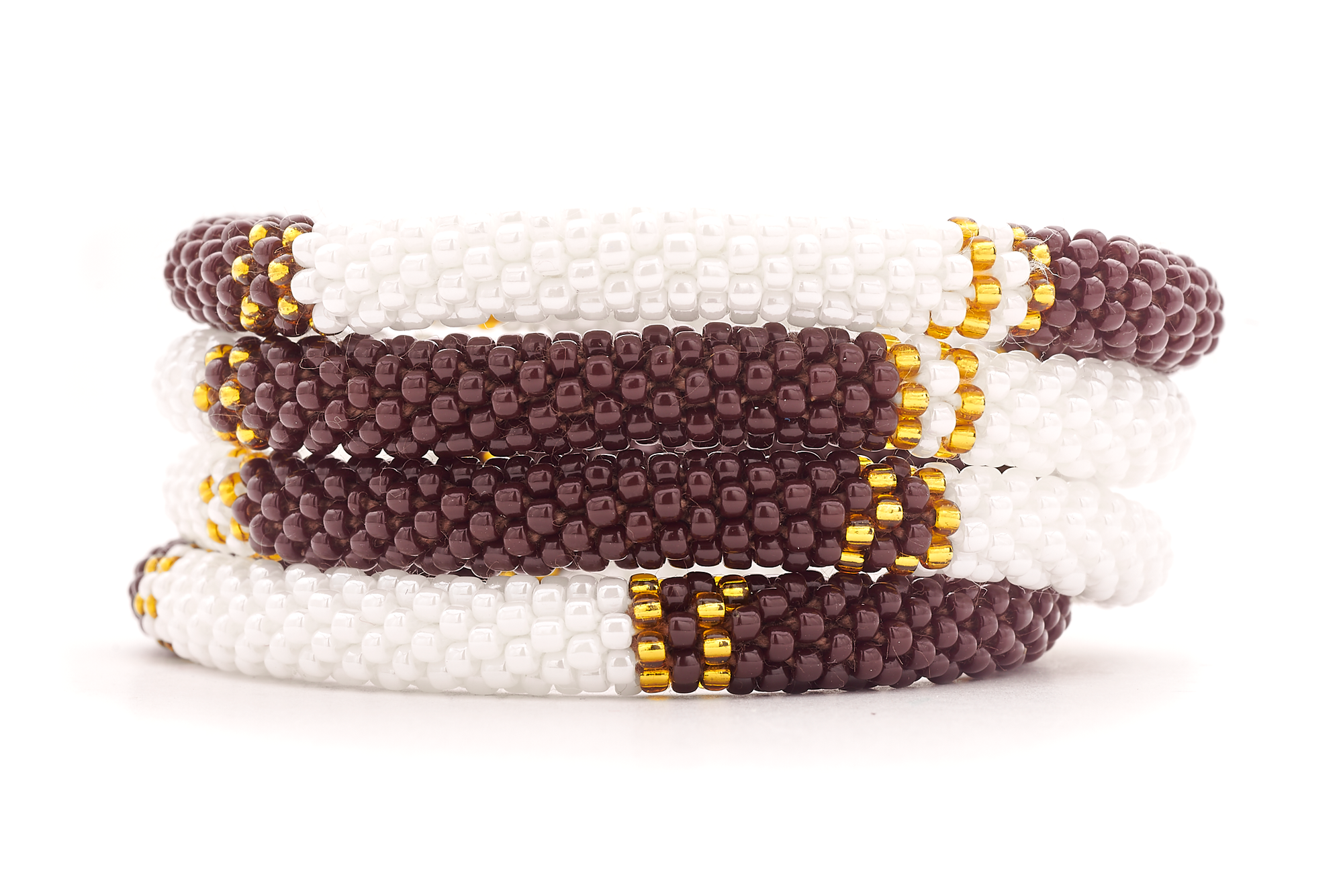 Sashka Co. handmade glass beaded friendship bracelet with brown, white, and gold glass beads in a half and half pattern. Crafted in Nepal by skilled artisans.