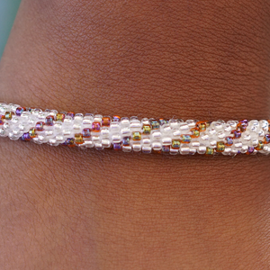 Sashka Co handmade beaded friendship bracelet with clear and iridescent mixed glass beads. Crafted in Nepal by skilled artisans.