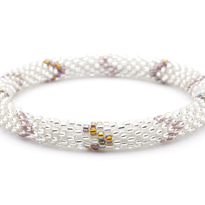 Sashka Co handmade beaded friendship bracelet with clear, mauve, and iridescent glass beads. Crafted in Nepal by skilled artisans.