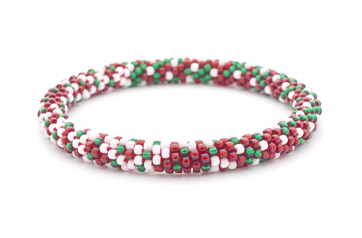 Sashka Co. handmade glass beaded friendship bracelet with a confetti mix of red, white, and green glass beads in a festive holiday pattern. Crafted in Nepal by skilled artisans.