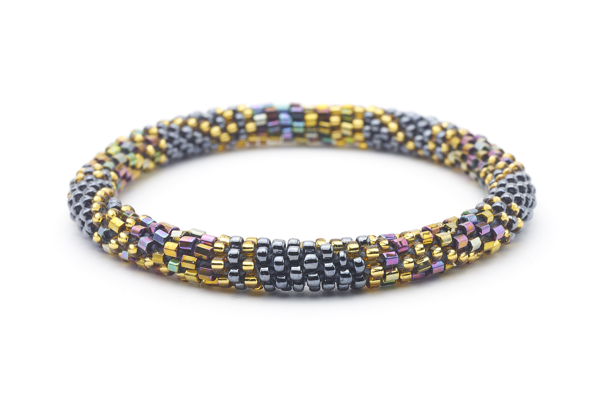 Sashka Co handmade beaded friendship bracelet with gold, iridescent, and silver glass beads. Crafted in Nepal by skilled artisans.