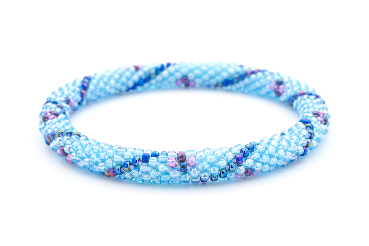 Sashka Co handmade beaded friendship bracelet with light blue, iridescent blue, and purple glass beads. Crafted in Nepal by skilled artisans.