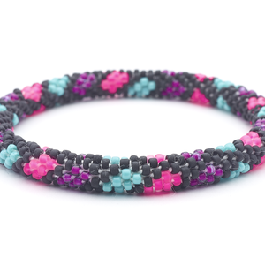 Sashka Co. handmade glass beaded friendship bracelet with matte black, matte pink, purple, and turquoise glass beads. Crafted in Nepal by skilled artisans.