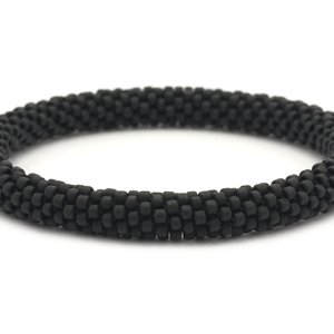 Sashka Co handmade beaded friendship bracelet with solid matte black glass beads. Crafted in Nepal by skilled artisans.

