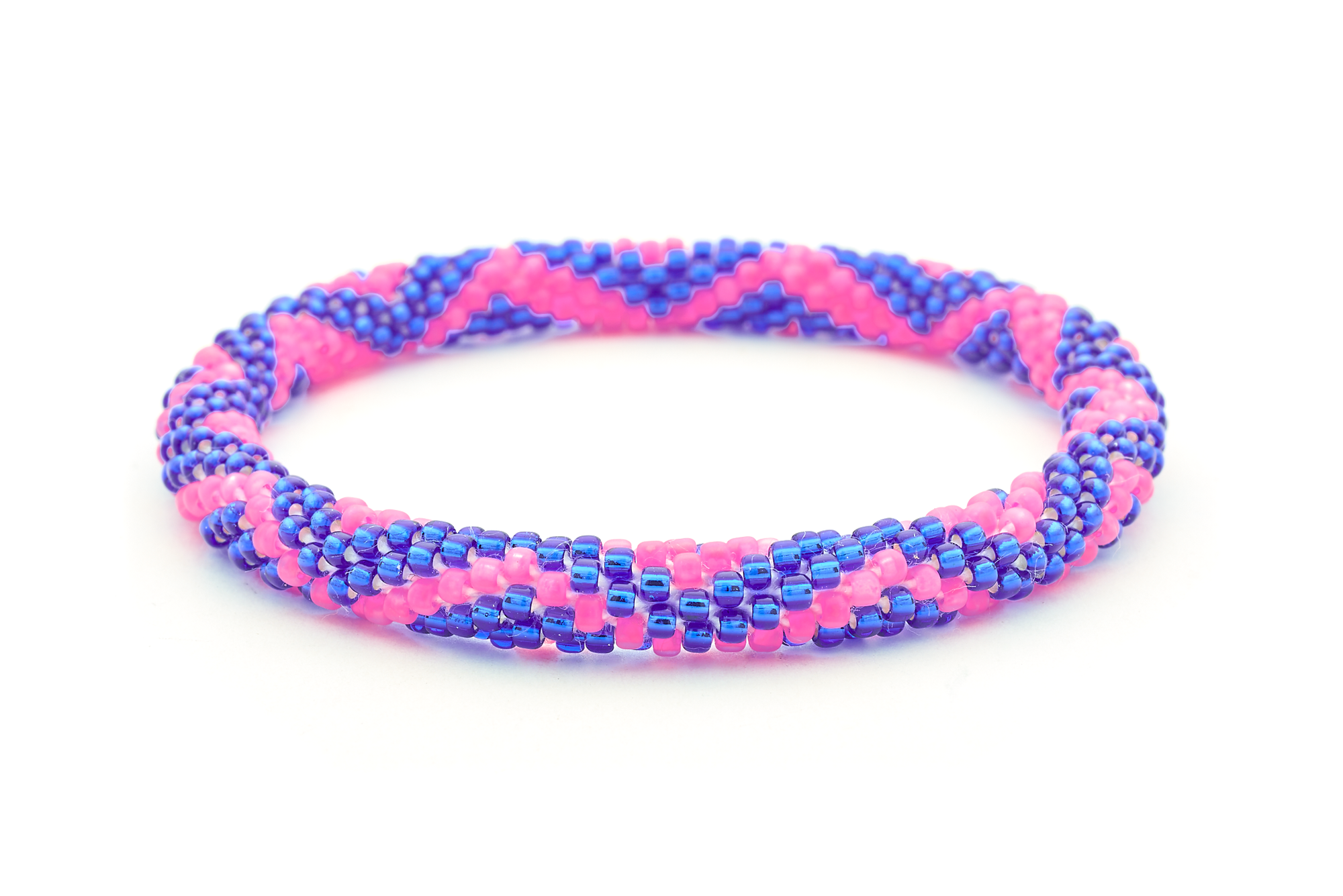 Sashka Co. handmade glass beaded friendship bracelet with matte pink and blue glass beads in a zigzag pattern. Crafted in Nepal by skilled artisans.