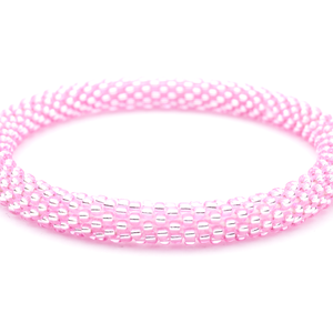 Sashka Co handmade beaded friendship bracelet with metallic pink glass beads. Crafted in Nepal by skilled artisans.