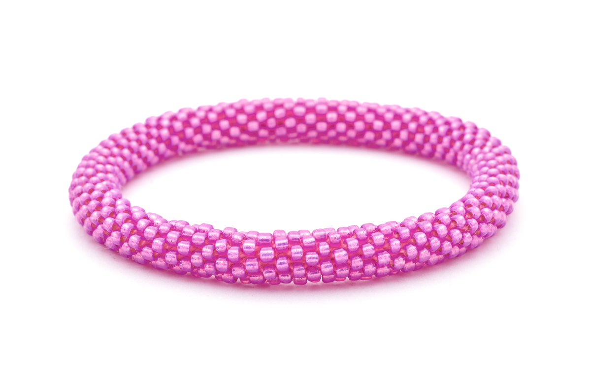 Sashka Co handmade beaded friendship bracelet with metallic pink glass beads. Crafted in Nepal by skilled artisans.