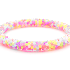 Sashka Co handmade beaded friendship bracelet with neon pink, purple, yellow, green, and light blue glass beads. Crafted in Nepal by skilled artisans.