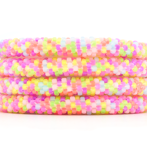 Sashka Co handmade beaded friendship bracelet with neon pink, purple, yellow, green, and light blue glass beads. Crafted in Nepal by skilled artisans.