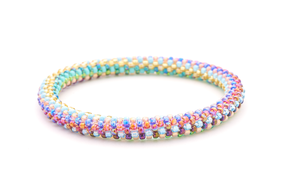 Sashka Co. handmade glass beaded friendship bracelet with orange, red, green, blue, turquoise, and gold glass beads. Crafted in Nepal by skilled artisans.