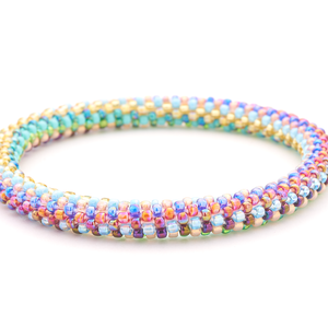 Sashka Co. handmade glass beaded friendship bracelet with orange, red, green, blue, turquoise, and gold glass beads. Crafted in Nepal by skilled artisans.