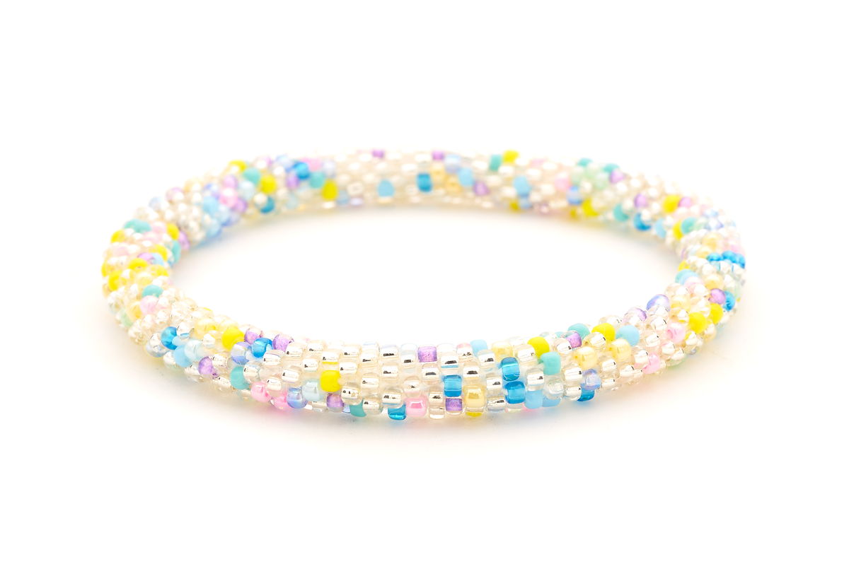 Sashka Co. handmade glass beaded friendship bracelet with confetti pattern in clear, pink, purple, yellow, turquoise, and blue. Hand-crocheted in Nepal.