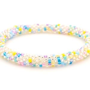 Sashka Co. handmade glass beaded friendship bracelet with confetti pattern in clear, pink, purple, yellow, turquoise, and blue. Hand-crocheted in Nepal.
