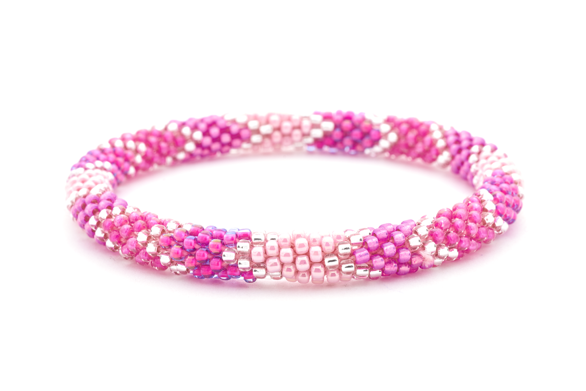 Sashka Co. handmade glass beaded friendship bracelet with shades of pink and clear glass beads in a chevron pattern. Crafted in Nepal by skilled artisans.