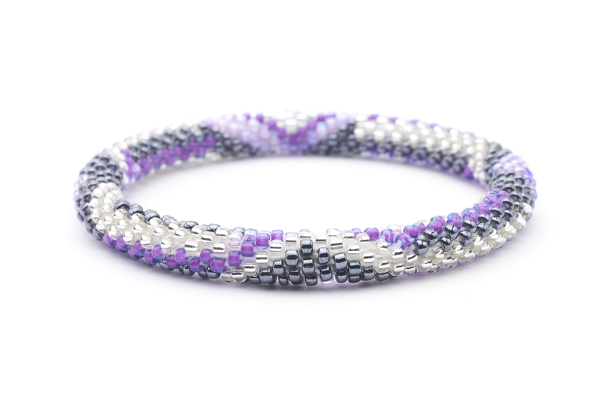 Sashka Co. handmade glass beaded friendship bracelet with purple, clear, and silver glass beads in a zipper zigzag pattern. Crafted in Nepal by skilled artisans.