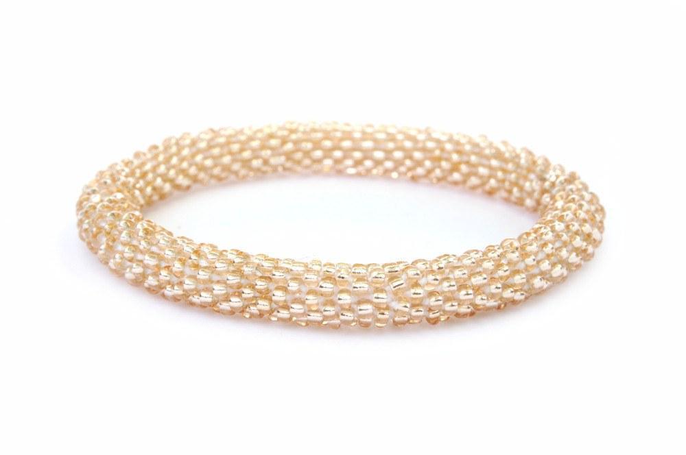 Sashka Co handmade beaded friendship bracelet with rose gold glass beads. Crafted in Nepal by skilled artisans.