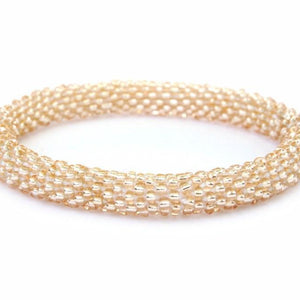 Sashka Co handmade beaded friendship bracelet with rose gold glass beads. Crafted in Nepal by skilled artisans.