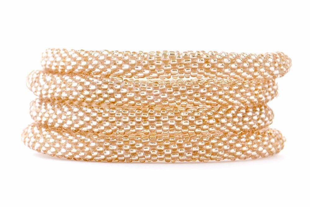 Sashka Co handmade beaded friendship bracelet with rose gold glass beads. Crafted in Nepal by skilled artisans.
