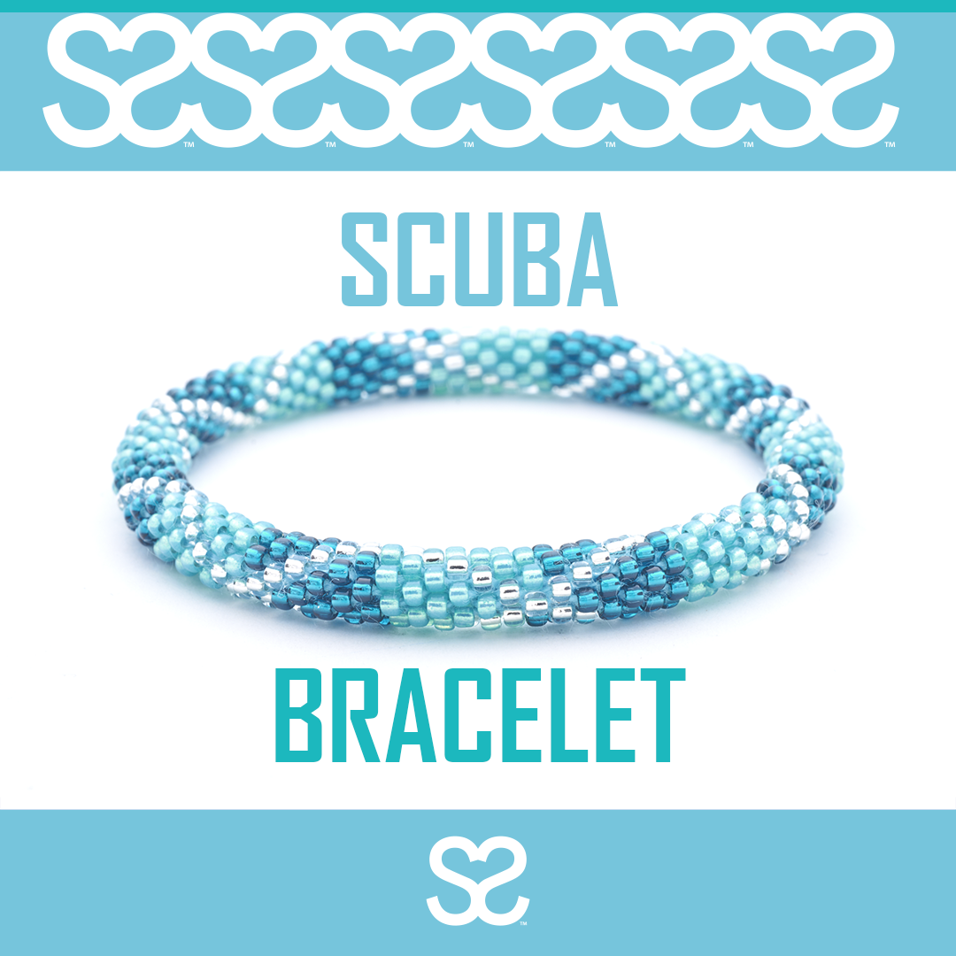 Sashka Co handmade beaded friendship bracelet with teal, aqua, and clear glass beads. Crafted in Nepal by skilled artisans.