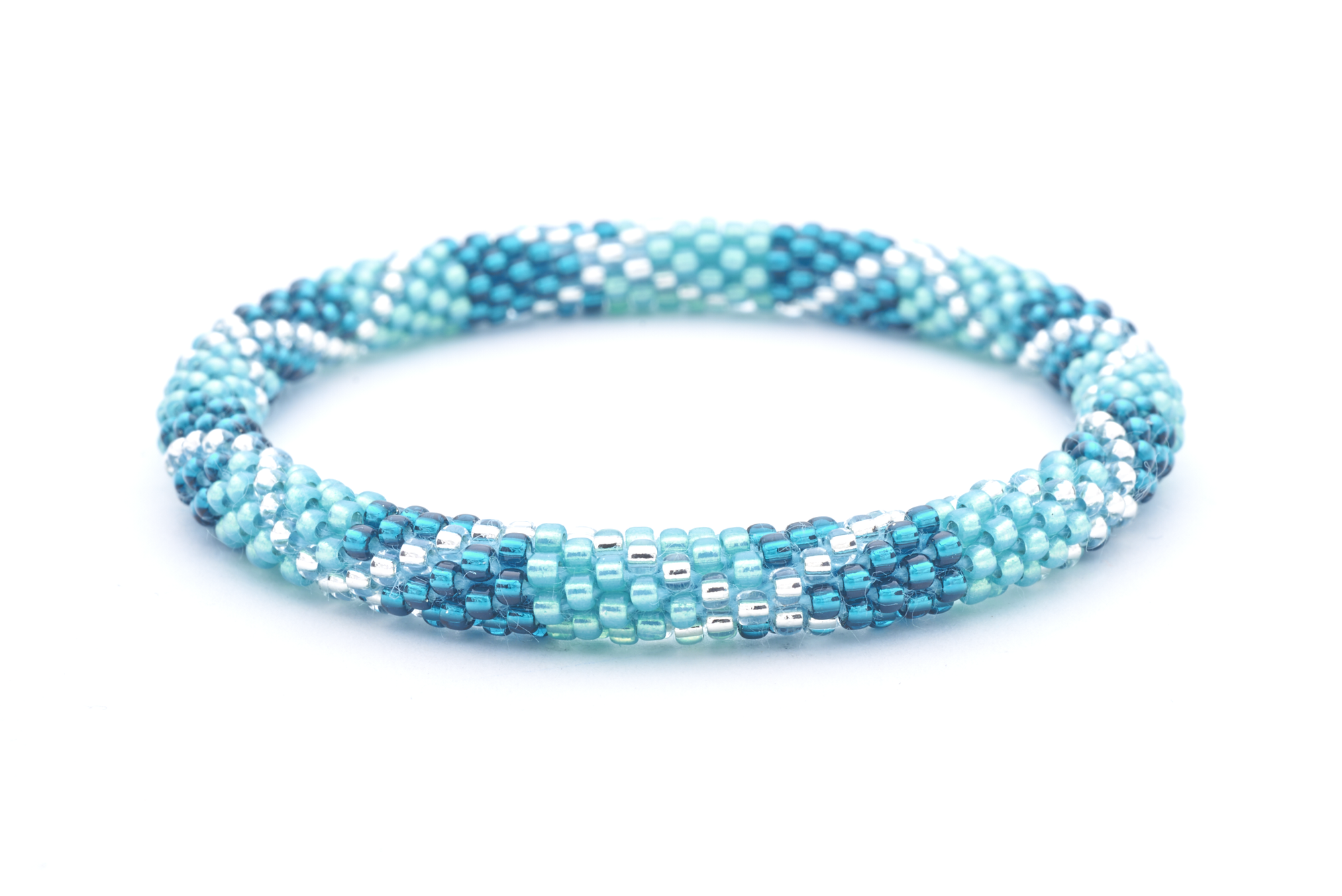 Sashka Co handmade beaded friendship bracelet with teal, aqua, and clear glass beads. Crafted in Nepal by skilled artisans.