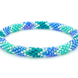 Sashka Co handmade beaded friendship bracelet with teal, turquoise, clear, and blue glass beads. Crafted in Nepal by skilled artisans.