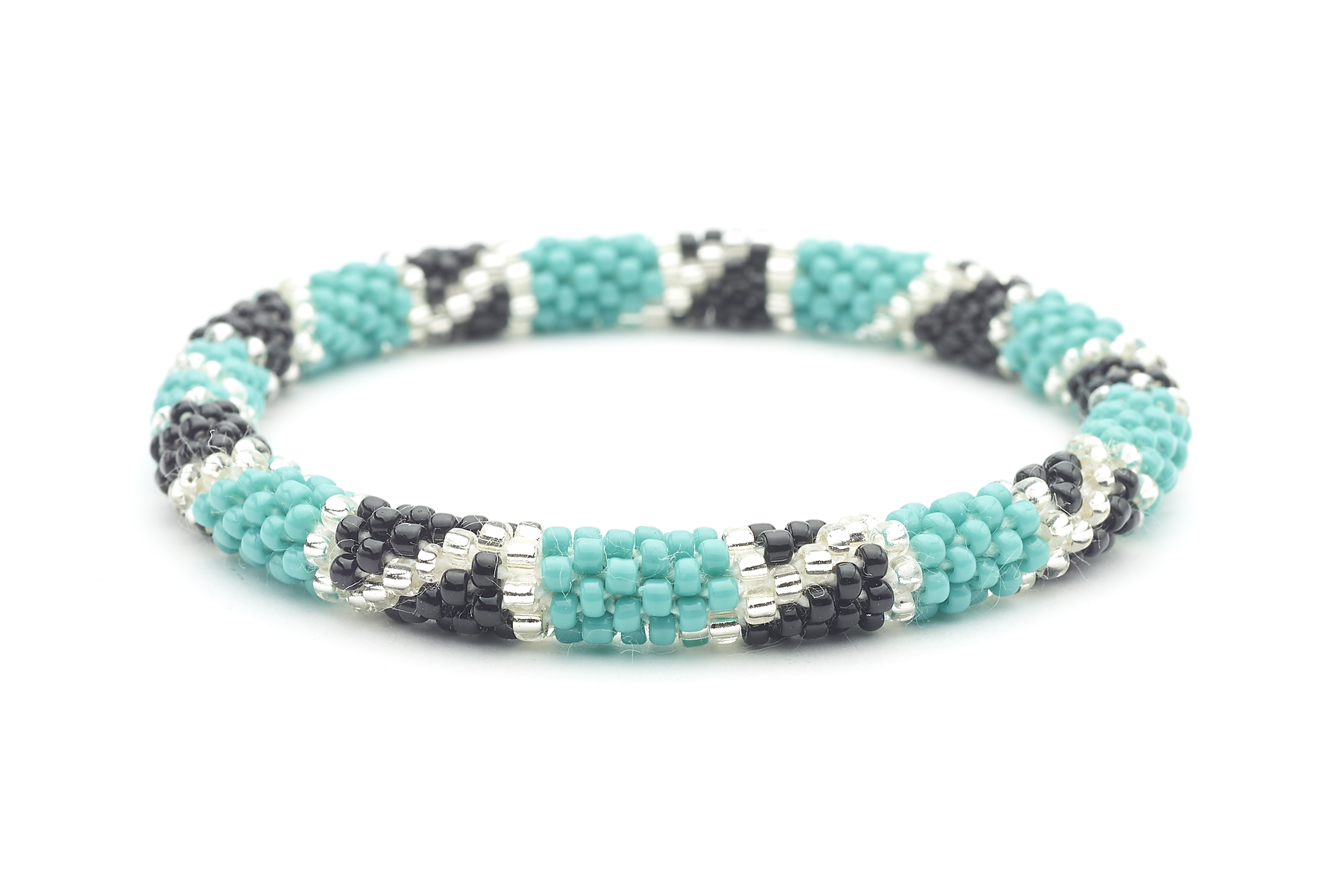 Sashka Co handmade beaded friendship bracelet with turquoise, black, and clear glass beads in a block spiral design. Crafted in Nepal by skilled artisans.