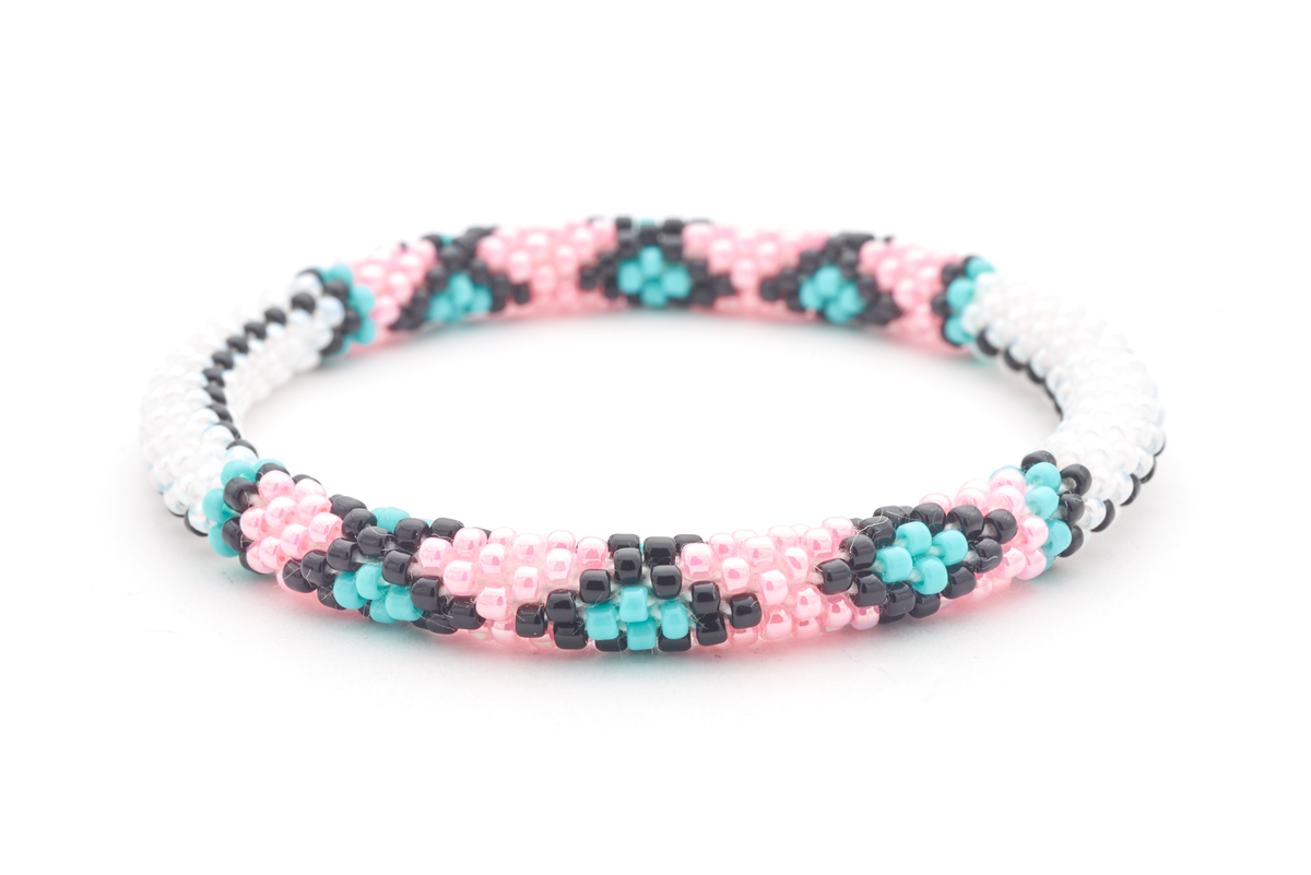 Sashka Co. handmade glass beaded friendship bracelet with white, black, pink, and turquoise glass beads. Crafted in Nepal by skilled artisans.
