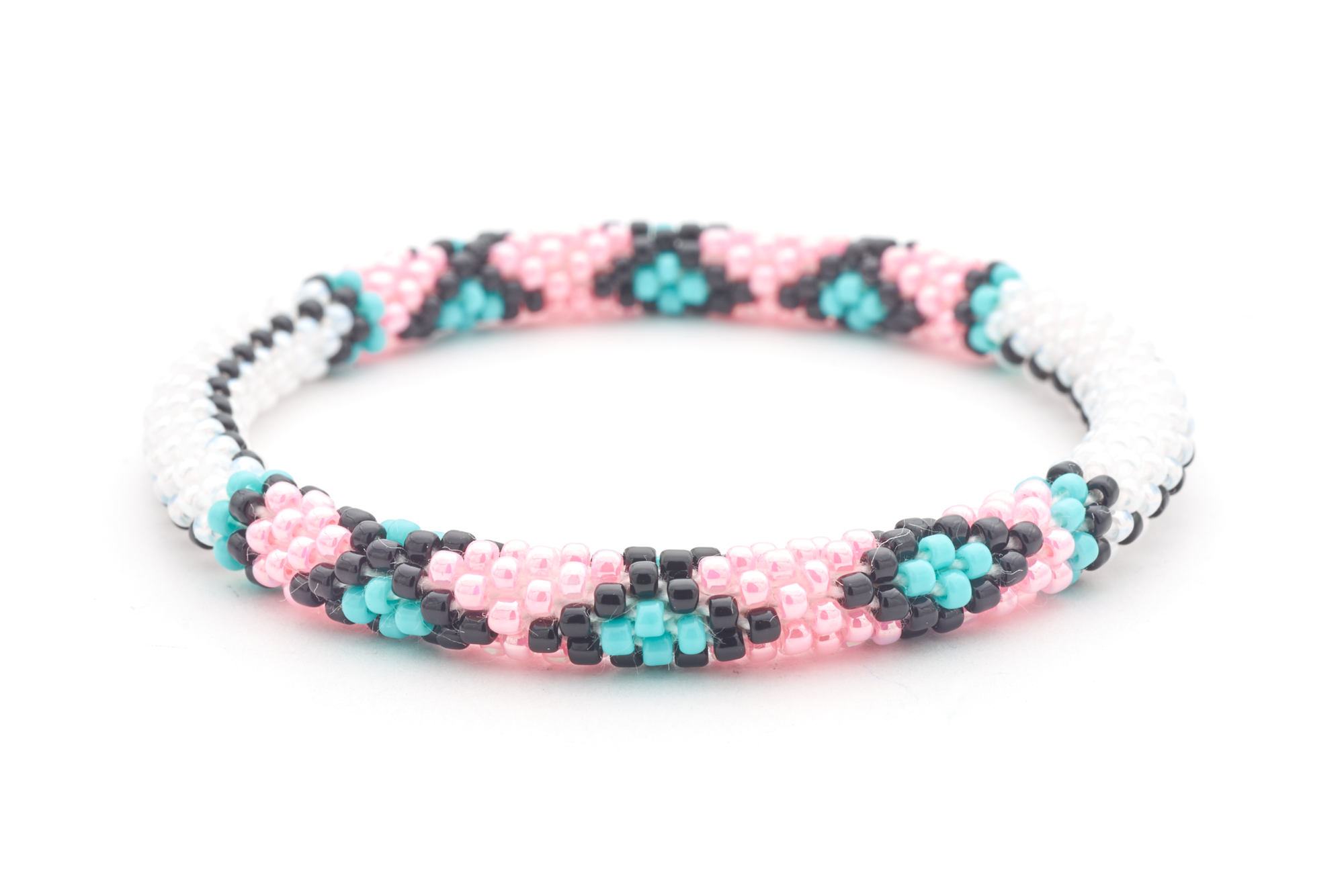 Sashka Co. handmade glass beaded friendship bracelet with white, black, pink, and turquoise glass beads. Crafted in Nepal by skilled artisans.