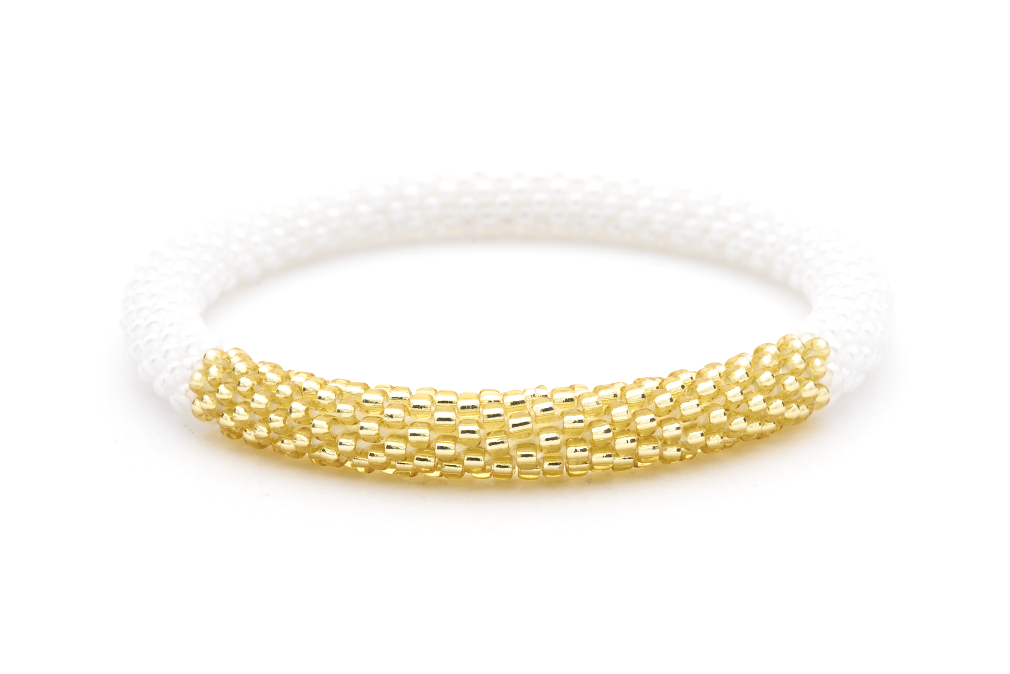 Sashka Co handmade beaded friendship bracelet with white and champagne gold glass beads. Crafted in Nepal by skilled artisans.