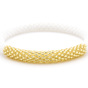 Sashka Co handmade beaded friendship bracelet with white and champagne gold glass beads. Crafted in Nepal by skilled artisans.