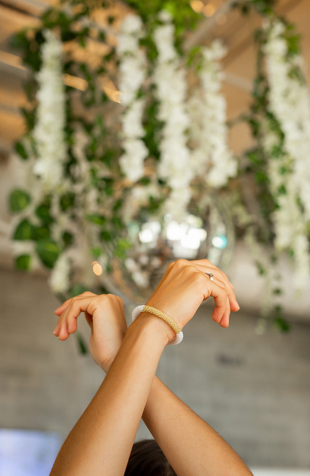 Sashka Co handmade beaded friendship bracelet with white and champagne gold glass beads. Crafted in Nepal by skilled artisans.