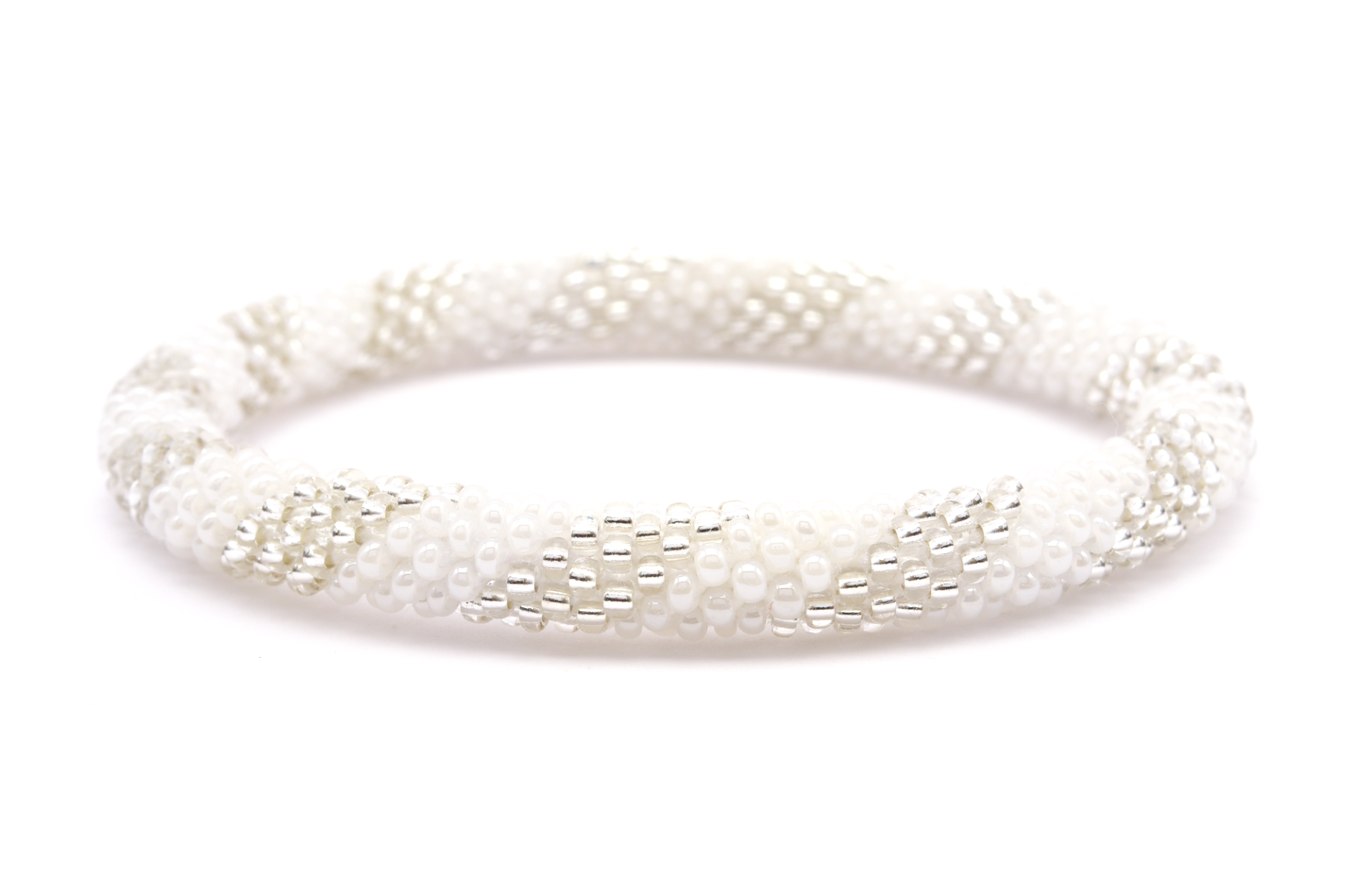 Sashka Co. handmade glass beaded friendship bracelet with white and clear glass beads in a spiral pattern. Crafted in Nepal by skilled artisans.
