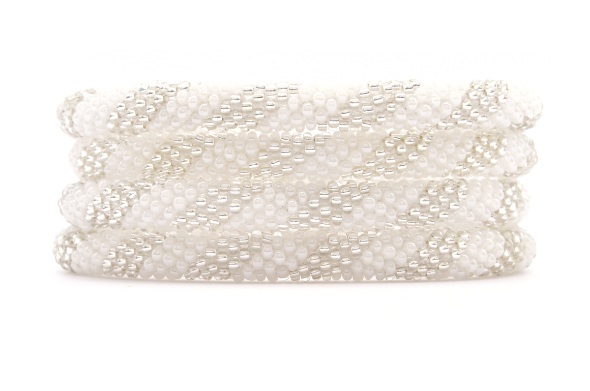Sashka Co. handmade glass beaded friendship bracelet with white and clear glass beads in a spiral pattern. Crafted in Nepal by skilled artisans.