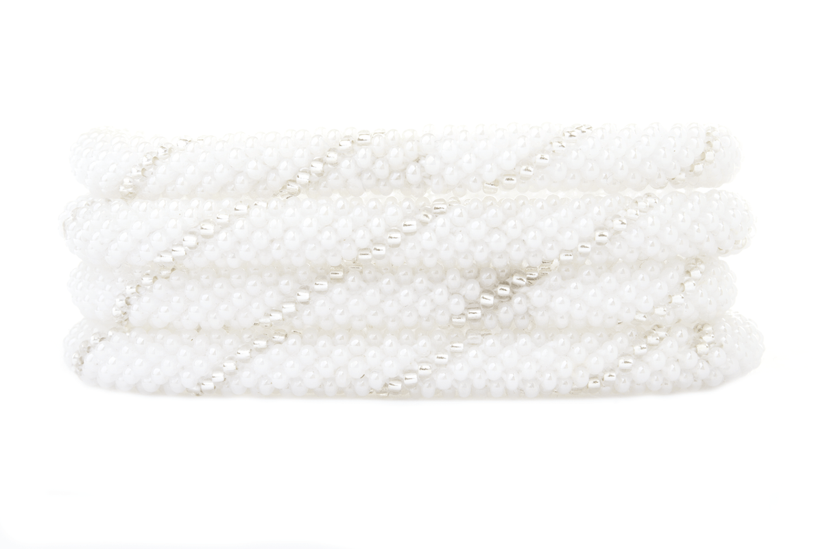 Sashka Co. handmade glass beaded friendship bracelet with white and clear glass beads in a spiral pattern. Crafted in Nepal by skilled artisans.