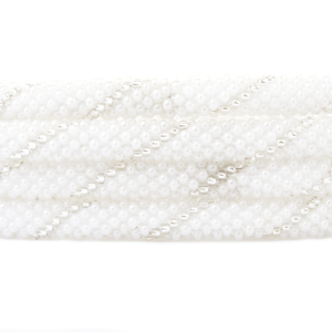 Sashka Co. handmade glass beaded friendship bracelet with white and clear glass beads in a spiral pattern. Crafted in Nepal by skilled artisans.