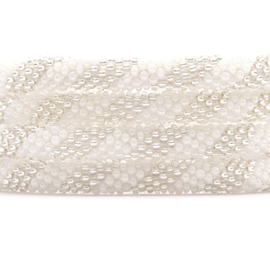 Sashka Co. handmade glass beaded friendship bracelet with white and clear glass beads in a spiral pattern. Crafted in Nepal by skilled artisans.